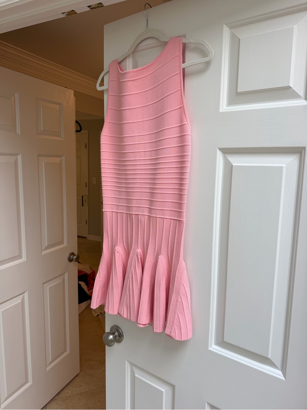Sleeveless Pink Knit Peplum Mini Dress